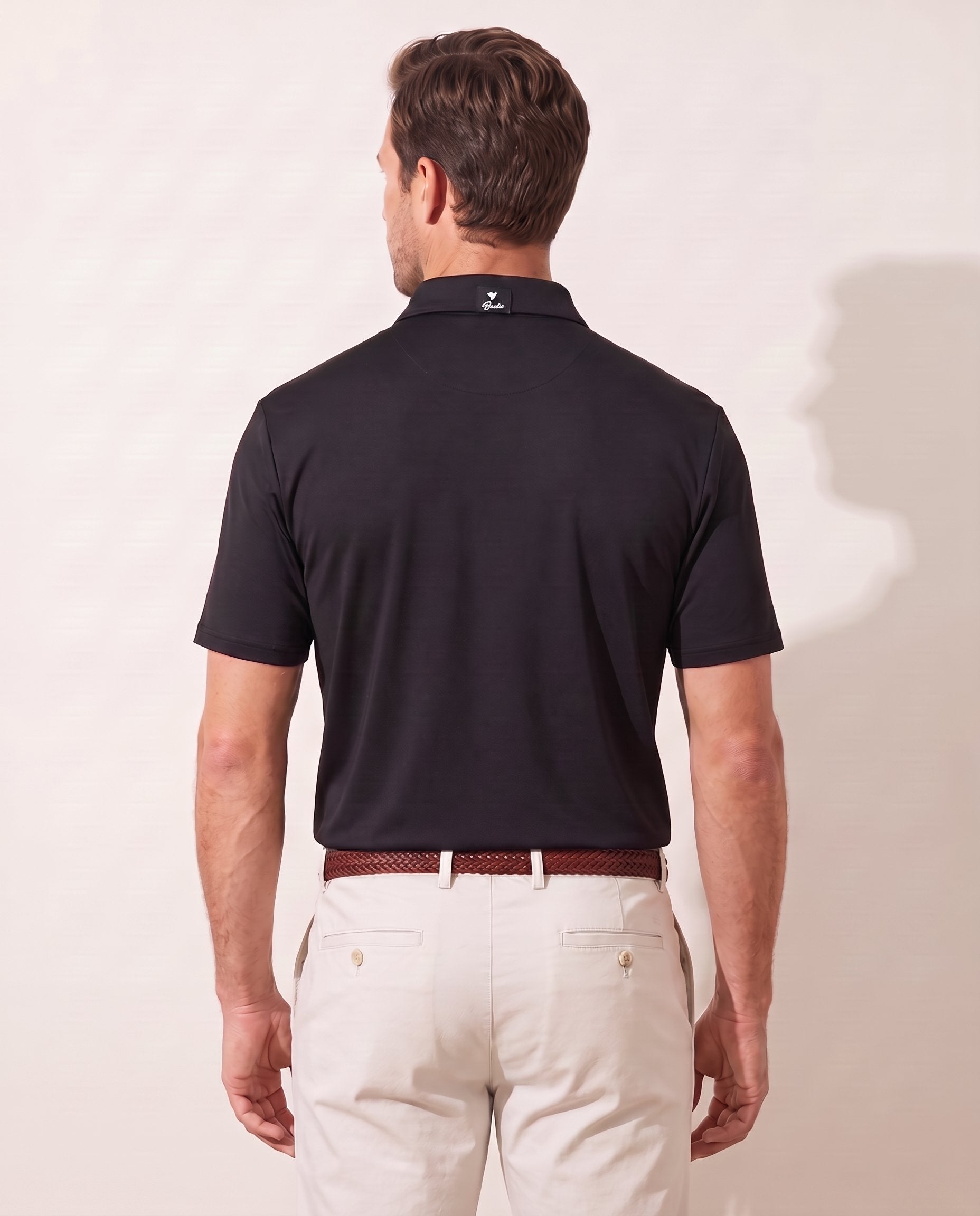 Onyx Oasis polo on model — back view