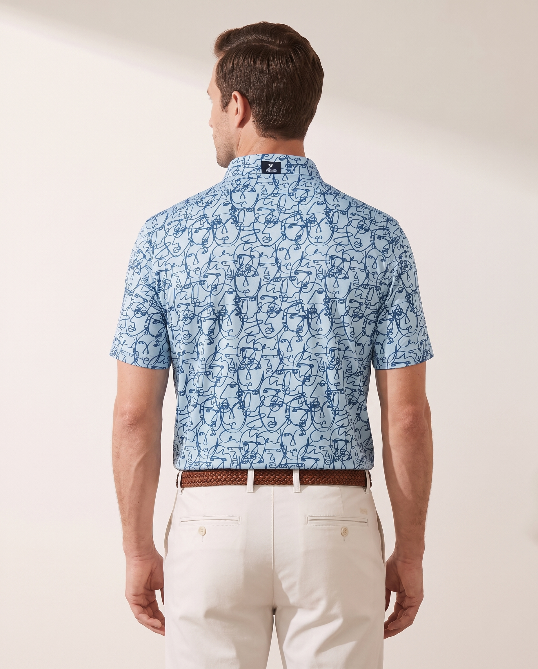 All Eyes On Me polo on model — back view