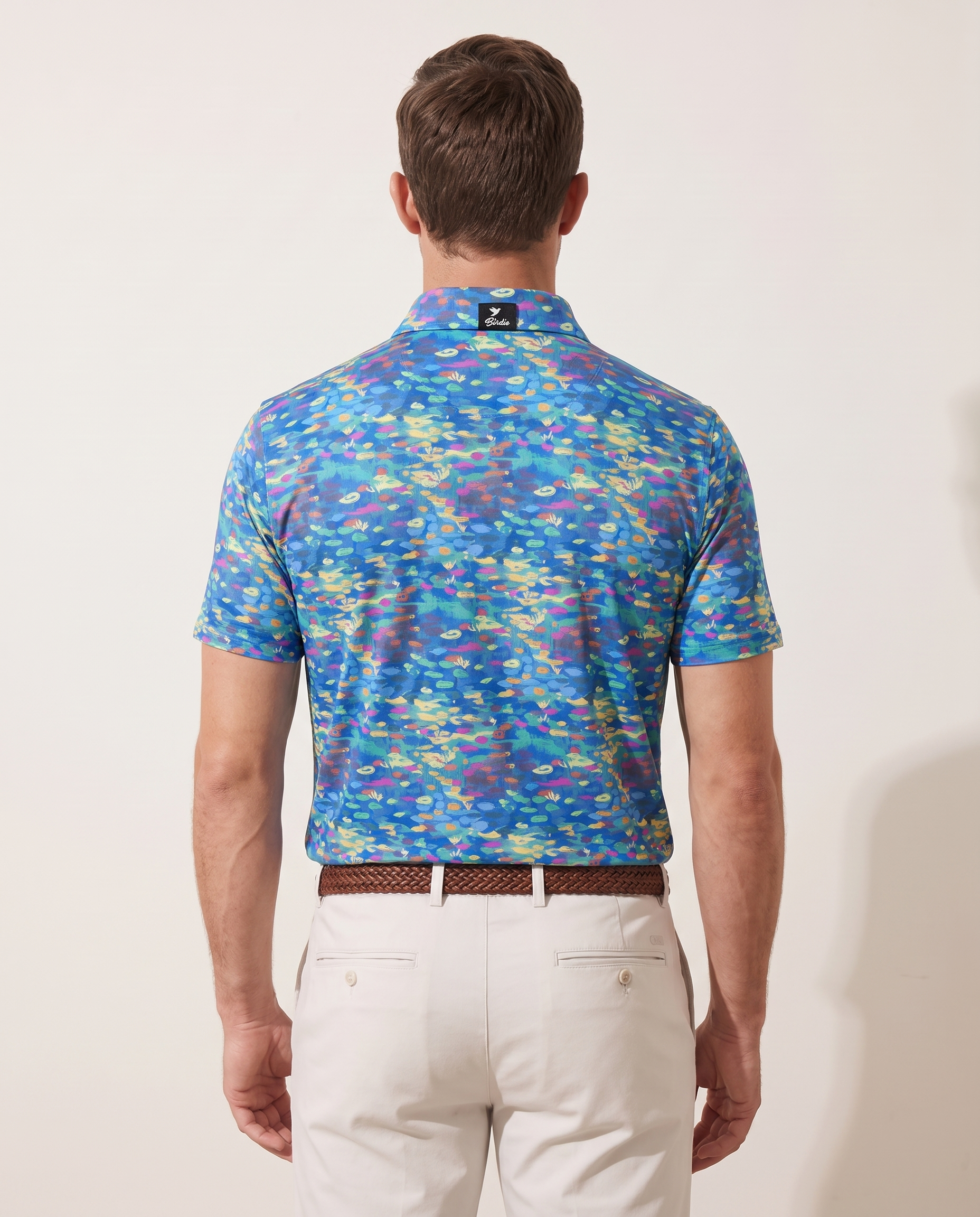 First Impressionism polo on model — back view