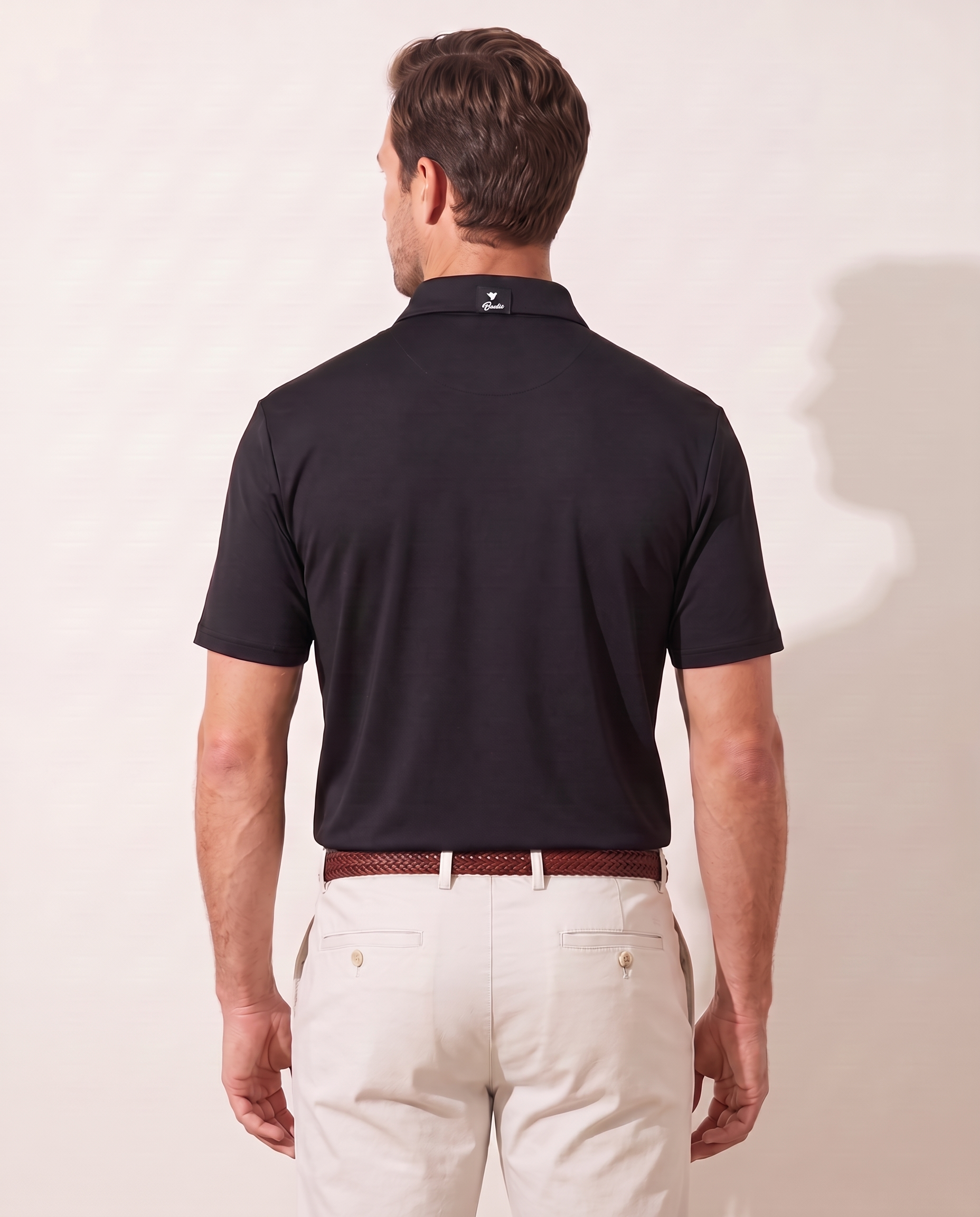 Onyx Oasis polo on model — back view