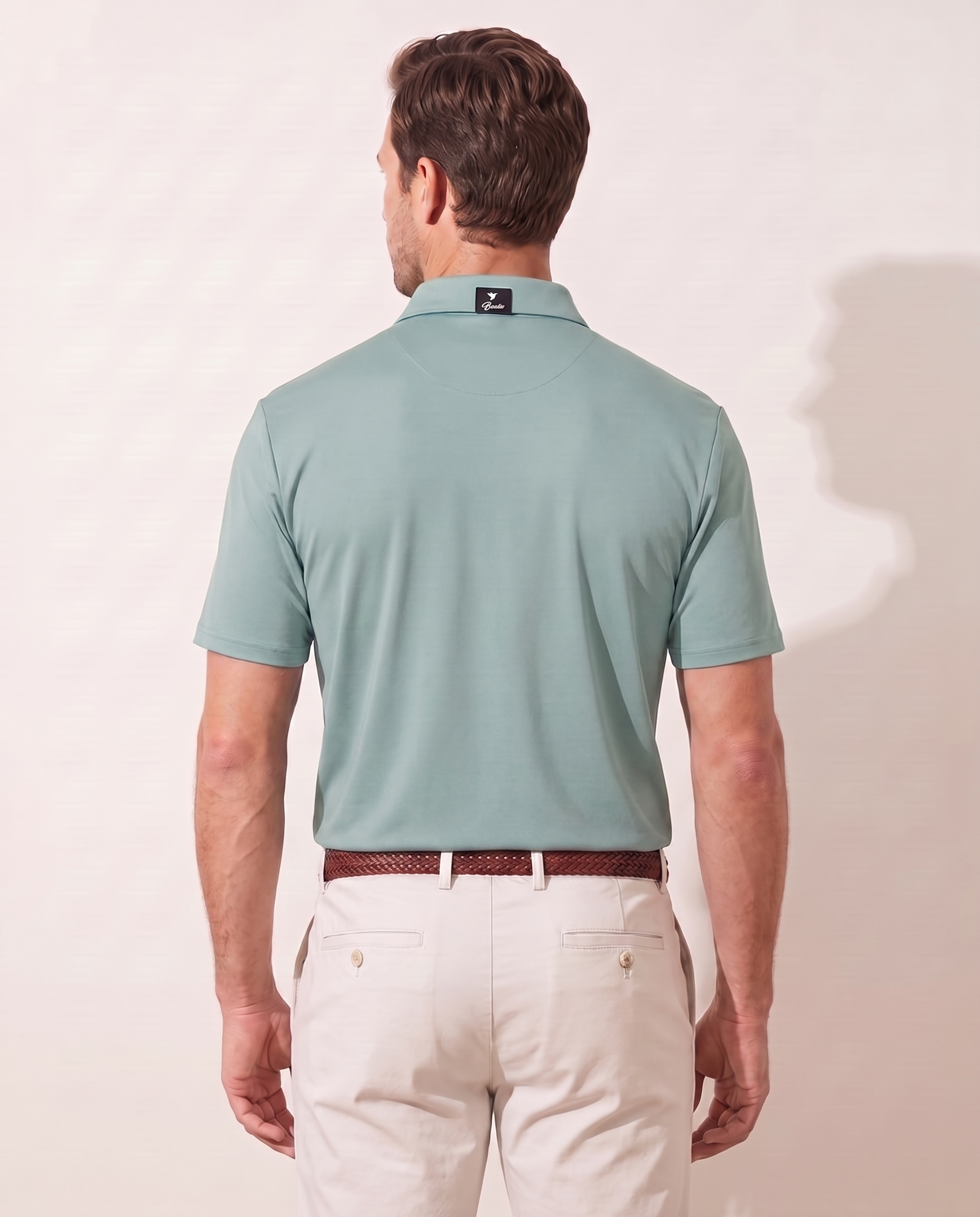 Seafoam Swing polo on model — back view