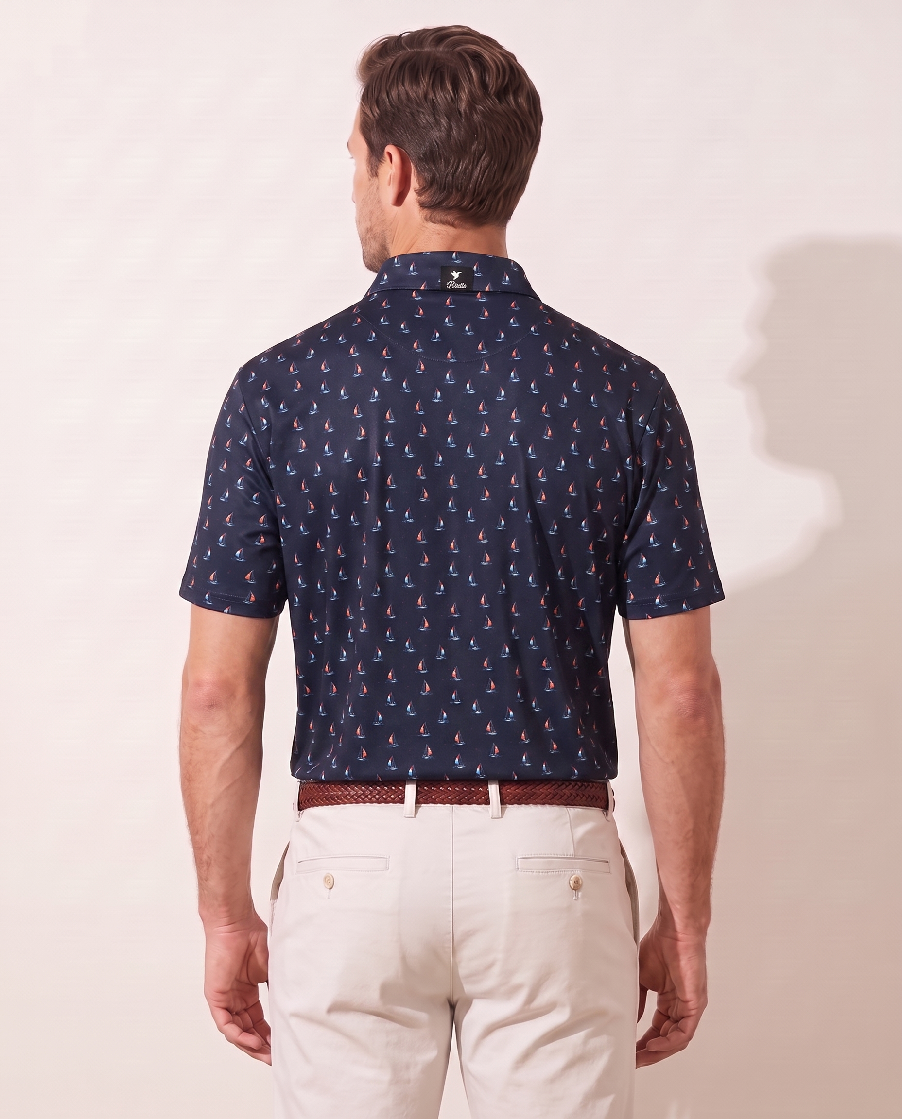 Smooth Sailing polo on model — back view